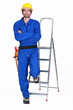 Portrait of a standoffish tradesman with his arms crossed