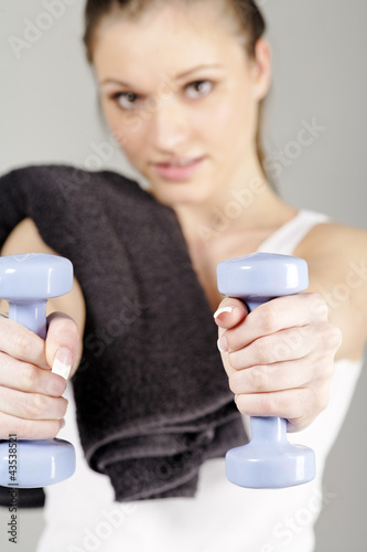 Photo: Woman working out with weights Woman working out with weights