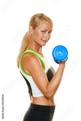 Foto: Frau mit Hanteln beim Krafttraining Frau mit Hanteln beim Krafttraining