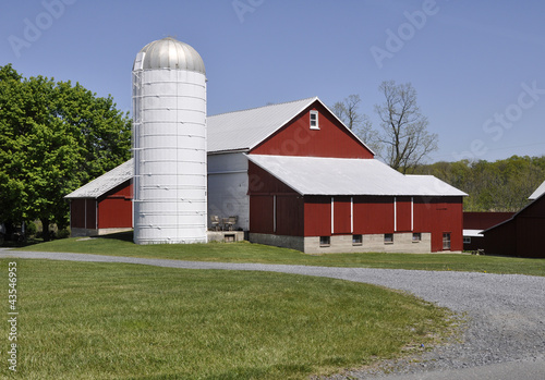 Photo: red barn and silo in rural Pennsylvania red barn and silo in rural Pennsylvania