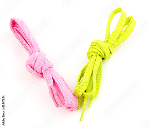 Photo: Colorful shoelaces isolated on white Colorful shoelaces isolated on white