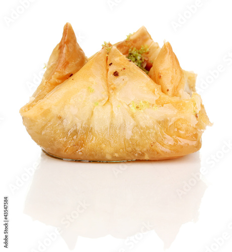 Photo: Sweet baklava isolated on white Sweet baklava isolated on white