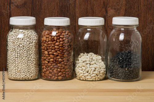 Photo: Beans in glass canisters in a kitchen Beans in glass canisters in a kitchen