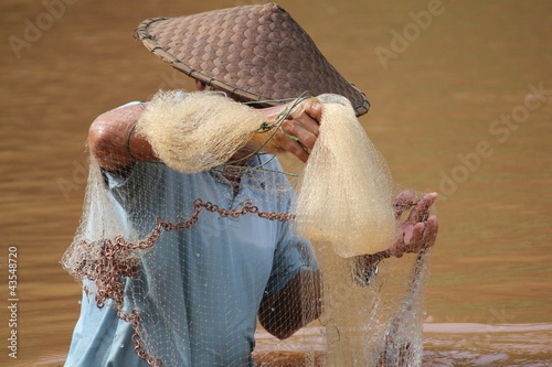 Photo: Pêcheur en Asie Pêcheur en Asie