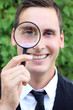 Man with Magnifying Glass