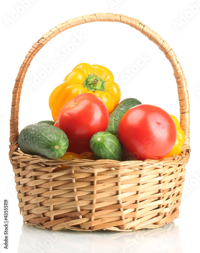 Photo: fresh vegetables in basket isolated on white fresh vegetables in basket isolated on white