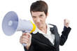 Young business lady screaming to loudspeaker