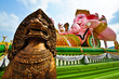 elephant headed god and bronze lion statue in Thailand
