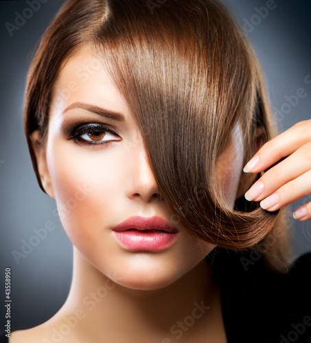 Photo: Hair. Beauty Girl With Healthy Long Brown Hair Hair. Beauty Girl With Healthy Long Brown Hair