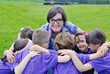 happy kids group with teacher in nature