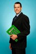 Side view portrait of a businessman with calculator
