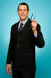 Male executive showing credit card