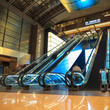 Photo: moving escalators in lobby at night moving escalators in lobby at night
