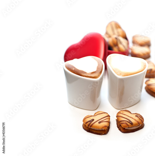 Photo: heart shaped cream cookies on red heart metal box and coffee heart shaped cream cookies on red heart metal box and coffee