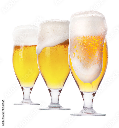 Photo: Frosty glass of light beer isolated Frosty glass of light beer isolated
