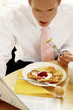 A man having his breakfast