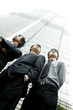 Three men in office attires