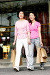 A mother and daughter with their shopping bags 