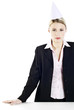 Foto: Businesswoman wearing party hat Businesswoman wearing party hat