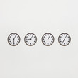 Different time zone clocks on wall