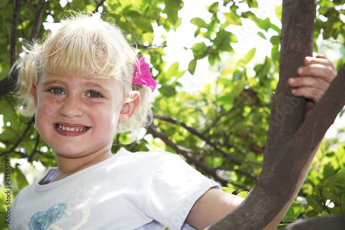 Photo: Girl on tree Girl on tree