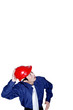 Businessman with a red safety helmet looking up