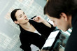 Businesswoman checking out her colleague