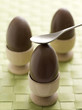 Chocolate eggs in egg cups