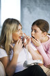 Mother and daughter receiving shocking news