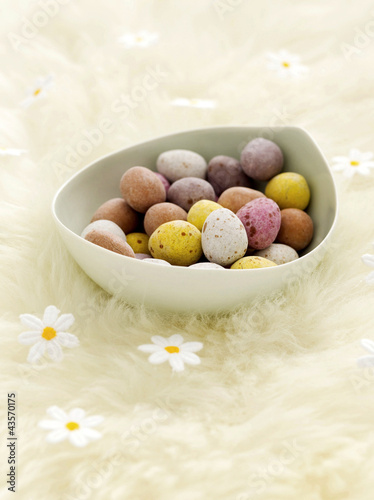 Photo: Mini eggs and fake daisies Mini eggs and fake daisies