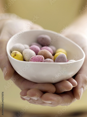 Photo: Mini eggs in bowl with model Mini eggs in bowl with model