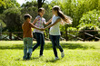 Children playing ring-around-the-rosy