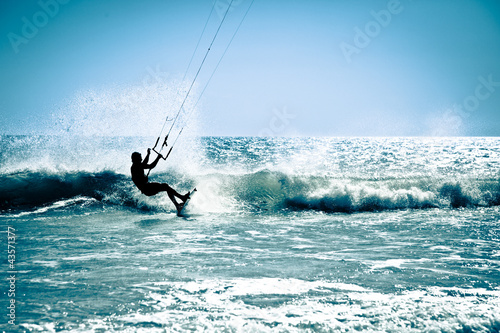 Photo: Kite surfing in waves. Kite surfing in waves.