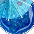Blue Curacao cocktail with ice and umbrella