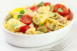 Bow tie pasta salad with tuna, tomatoes and green olives