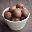 Close up of some red potatoes in a bowl