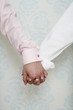 Couple holding hands
