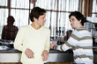 Two men looking at each other