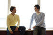 Two men facing each other