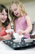 Kids learning baking