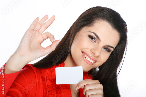 Photo: young, beautiful brunette holds a banner young, beautiful brunette holds a banner