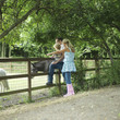 Man, woman and boy at a farm