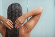 Portrait of relaxed woman taking shower