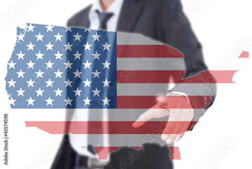 Photo: Businessman pushing USA flag map. Businessman pushing USA flag map.