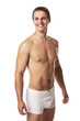 Photo: Handsome young man in underwear against white Handsome young man in underwear against white