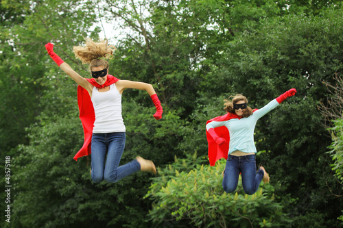 Photo: Super heros team jumping Super heros team jumping