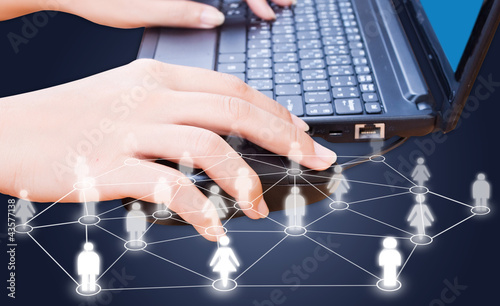 Photo: Business hand click mouse for social network. Business hand click mouse for social network.