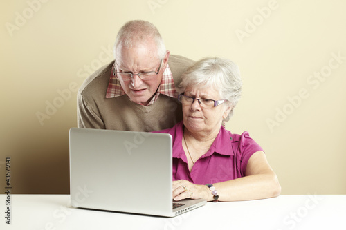 Photo: Senior using laptop Senior using laptop