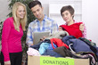 volunteer group with clothing donation