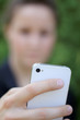 Young Attractive Businesswoman Texting On the Phone